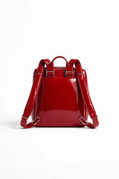 Red backpack on a white background